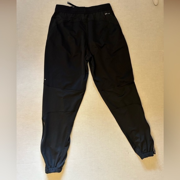 Nike women’s DriFit shield running jogger pants w/zip pockets & ankles Sz-XS X4 - Picture 3 of 12